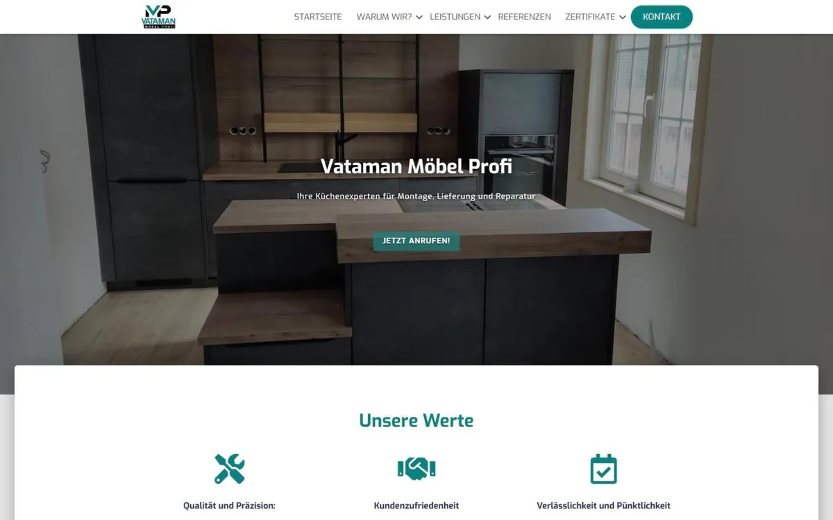 Startseite von vataman-moebel-profi.de mit anthrazitfarbener Küche, Firmenname und Button Jetzt anrufen
