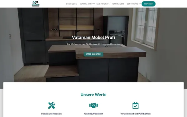 Startseite von vataman-moebel-profi.de mit anthrazitfarbener Küche, Firmenname und Button Jetzt anrufen